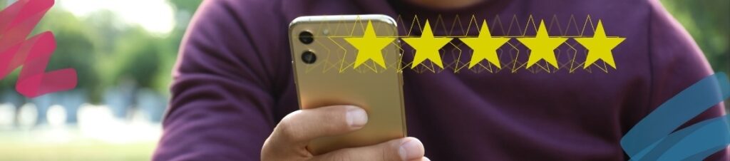 A person writing a 5 star review on their mobile phone.